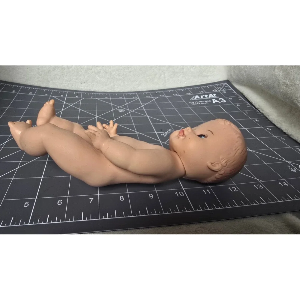 Vintage 8 Inch Vinyl Baby Doll Molded Hair Blue Eyes Drink and Wet Toy